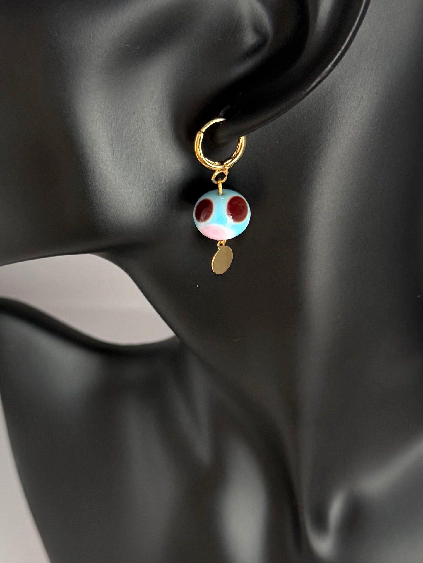 Boucle d'oreille unique (dernière chance)