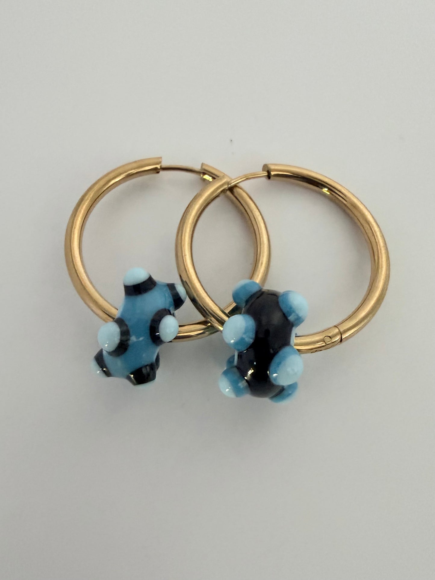 Boucle d'oreille (asymétrique)