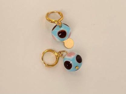 Boucle d'oreille unique (dernière chance)