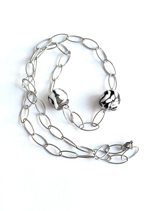 Collier ligne noir & blanc (acier)