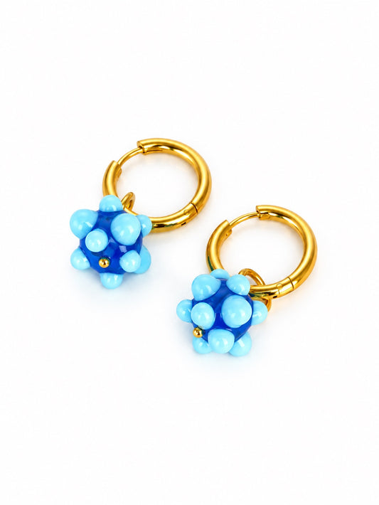 Boucle d'oreille créole unique